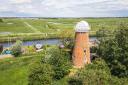 Martham Mill overlooks the River Thurne