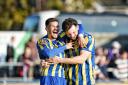 Ross Crane, left, celebrates his goal with Freddie Sass