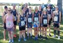 Three Counties Running Club members face the camera