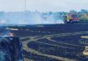 Firefighters from Cottenham and other parts of Cambridgeshire tackled a 45-acre field fire near Little Downham, which one resident's home narrowly missed.