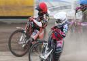 Jordan Jenkins (red helmet) secured a dramatic last heat victory over Harry McGurk (white helmet) to help Mildenhall Fen Tigers beat Belle Vue Colts.