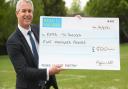 MP Steve Barclay with a £500 cheque from Anglian Water which has supported his Read to Succeed campaign.