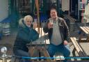 Drinkers catching up outside The Globe pub in Wisbech.