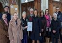 SE Cambs MP Lucy Frazer has welcomed £13m of funding for Cambridgeshire as part of the government's 'levelling up' plans. Pictured is Ms Frazer with Reverend Sue Giles, priest-in-charge at Holy Trinity church, Bottisham as part of her Covid community