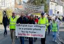 Matt Hancock and Lucy Frazer led protest march from Mildenhall to the site of part of the proposed solar farm.