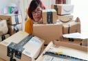 In February, Ely Foodbank was 'overwhelmed' by 650kg of donations. Social media admin Georgie's home was the delivery address for the wishlist donations. She is pictured hiding amongst the boxes which took over her whole kitchen and living room.