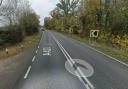 The A428 near St Neots has been blocked in both directions following a collision between a lorry and a car that caused an oil spill.