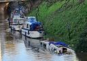 This sunken boat was left submerged in the River Nene at March over the Christmas break.