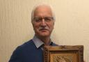 Author Bryan Wiles, with the copy that he carved of the Tadeusz Zielinski icon, the Mother of God Victorious, which was displayed at the altar before all the battles of the Second Polish Corps