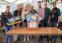 100,000th visitor to the Open Farm Sunday event at Park Farm Thorney. Host farmer Michael Sly is pictured second from the left.
