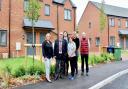 Laura Silvain, Cllr Andrew Woollard, Sarah Brind, Cllr Jan French, Tom Walczak and Dan Horn at the homes.