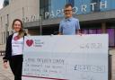 Austin presenting cheque to Eleanor Speed, Community Fundraiser at Royal Papworth Hospital.