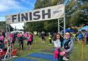 Chloe Gosling - with her daughter Aria-Rose - after completing the race