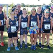 Three Counties Running Club members face the camera