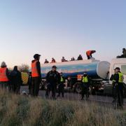 Just Stop Oil protesters on top of a tanker at one of their demonstrations