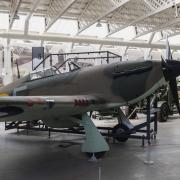 A Hawker Hurricane on display in The Battle of Britain Exhibition in Hangar 4 at IWM Duxford . Picture: IWM