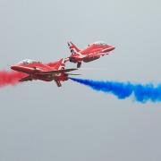 The Red Arrows crossover at the Flying Legends Air Show 2019 at IWM Duxford. The display team will appear at this year's 80th anniversary Duxford Battle of Britain Air Show weekend. Picture: Gerry Weatherhead