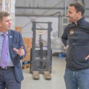 Thomas Robson-Kanu , founder and chief executive of The Turmeric Co, hosts a visit from Mayor Dr Nik Johnson