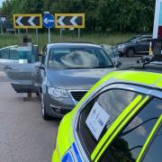 Moment a day out came to a sudden end for this disqualified driver, stopped on the A1 and his car seized. Three children not wearing seat belts were in the back seat.