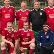 Wisbech Town's walking footballers kept their title hopes in the Peterborough & District Walking Football League alive in their latest round of fixtures.