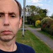 Cllr Mark Inskip with selfie from Sunday evening on an East Cambs village street lined with uncollected black bags