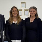 Ashlie Barnard (second from left), owner of Mayflower Financial Planning with staff members at their new office on March High Street.