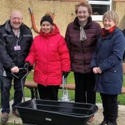 Members of Benwick Street Pride in Bloom were gifted a litter picking trolley to mark the group's 10-year anniversary.