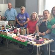 Christine and Peter James with their helpers