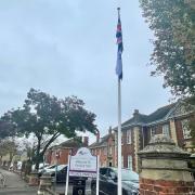 Israel flag at half-mast, at Fenland Hall, in March.