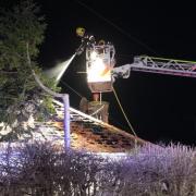 Firefighters at the scene of the bungalow fire in Hundred Road, March, last night (Thursday January 4).