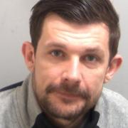 HMP Whitemoor inmate James Whitlock attempted to escape from custody while receiving hospital treatment.