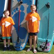 March brothers Ronnie, aged 10, and Albert, eight, raised £600 by completing a paddle boarding challenge at Houghton Mill, Huntingdon, on June 29.