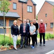 Laura Silvain, Cllr Andrew Woollard, Sarah Brind, Cllr Jan French, Tom Walczak and Dan Horn at the homes.