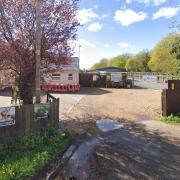 The existing site houses the dog grooming and kennel business Woodbury