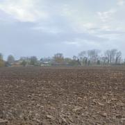 The land is south of Barker's Lane and east of Wimblington Road in March.