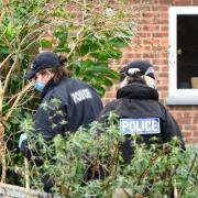 Cambridgeshire Police officers searched the grounds of Eliza Bibby's bungalow.