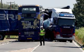 Two men were killed in the crash between a lorry and a double-decker bus at Wisbech St Mary.