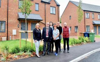 Laura Silvain, Cllr Andrew Woollard, Sarah Brind, Cllr Jan French, Tom Walczak and Dan Horn at the homes.